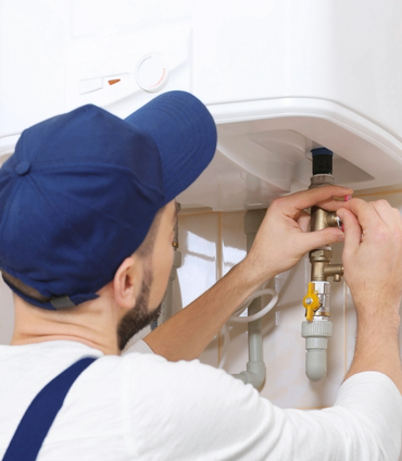 Water heater installation — new tank unit to code with permit