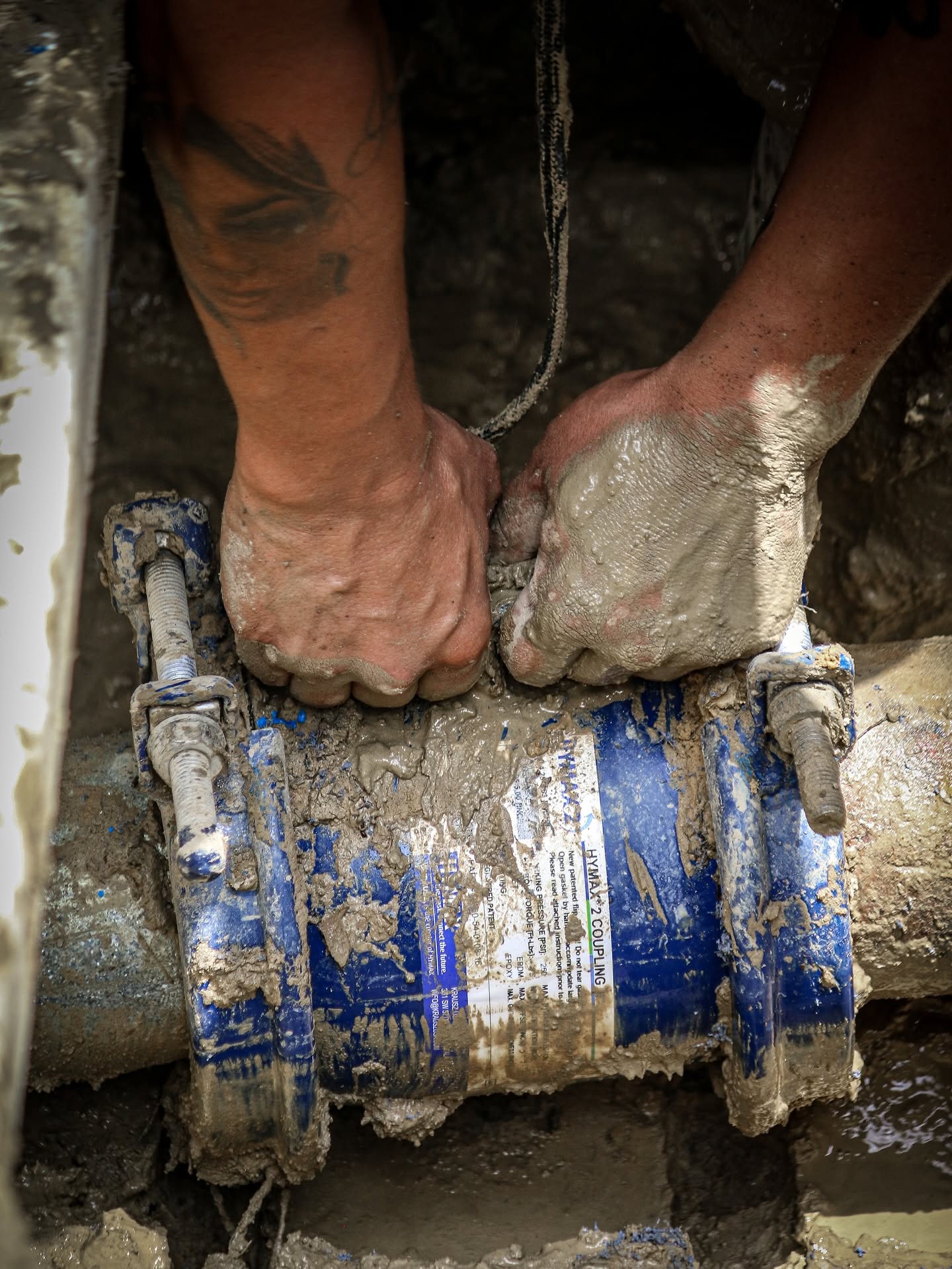 Staggs Plumbing technician clearing a drain line in a DFW home